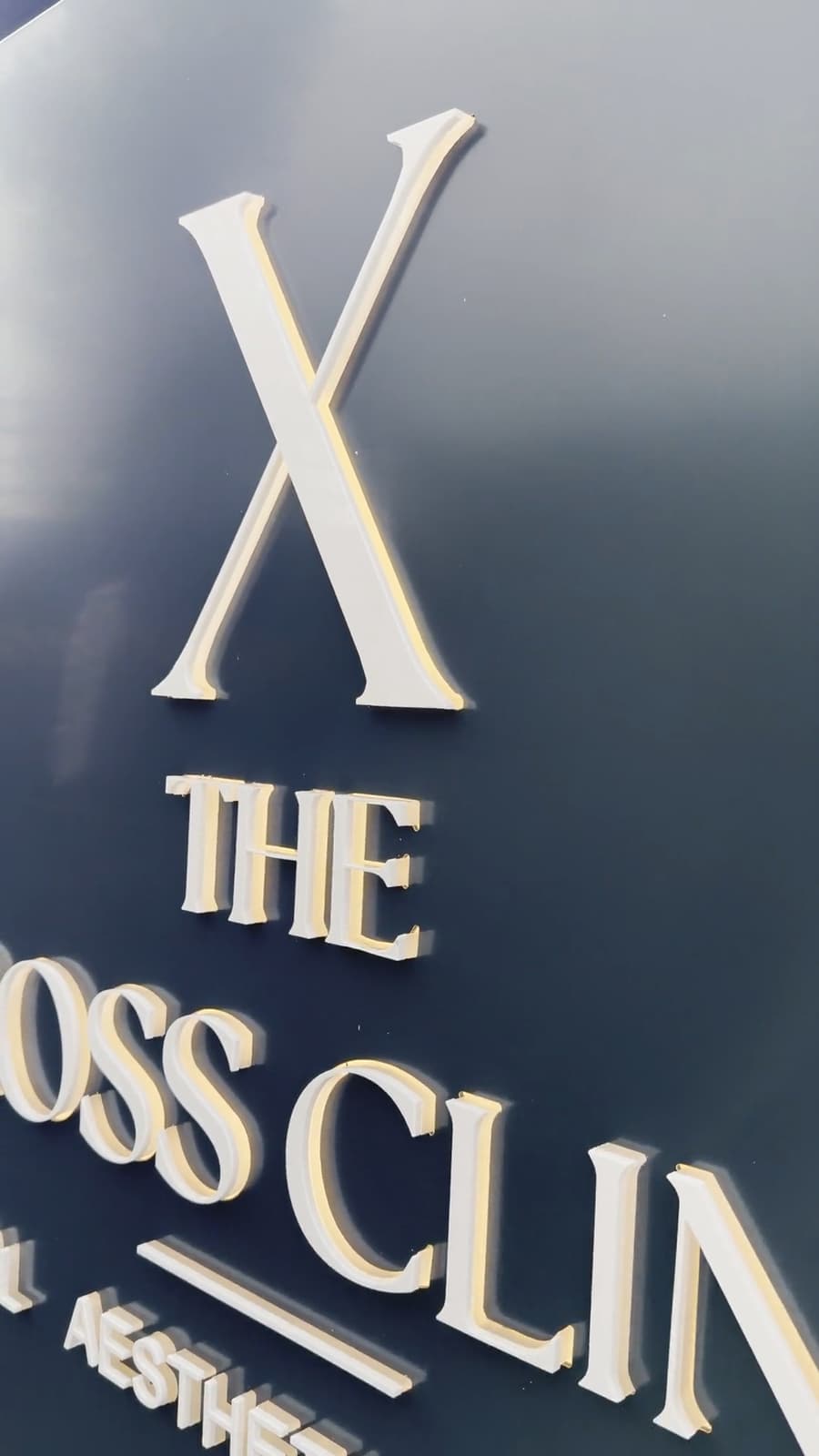 The Cross Clinic sign outside the building at 2B Crowhill Road, Bishopbriggs